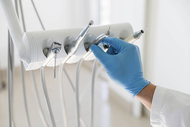 Professional Tooth Extraction technician working in Frankfort, MI
